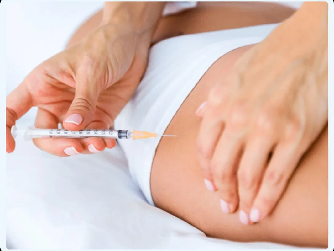 A clinician administering a subcutaneous peptide injection