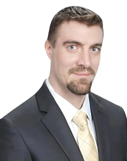 Dr. Jeremy Drollinger, MD, in a suit and tie